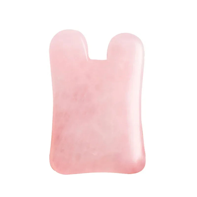 Rose quartz gua sha tool for facial and body massage therapy