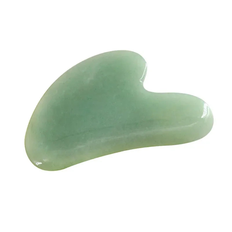 Rose quartz gua sha tool for facial and body massage therapy