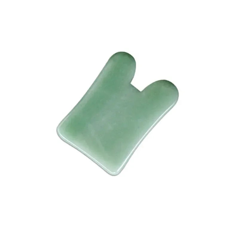 Rose quartz gua sha tool for facial and body massage therapy