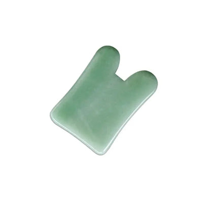 Rose quartz gua sha tool for facial and body massage therapy