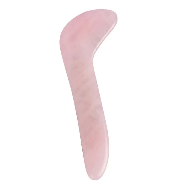 Rose quartz gua sha tool for facial and body massage therapy