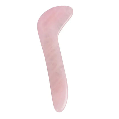 Rose quartz gua sha tool for facial and body massage therapy