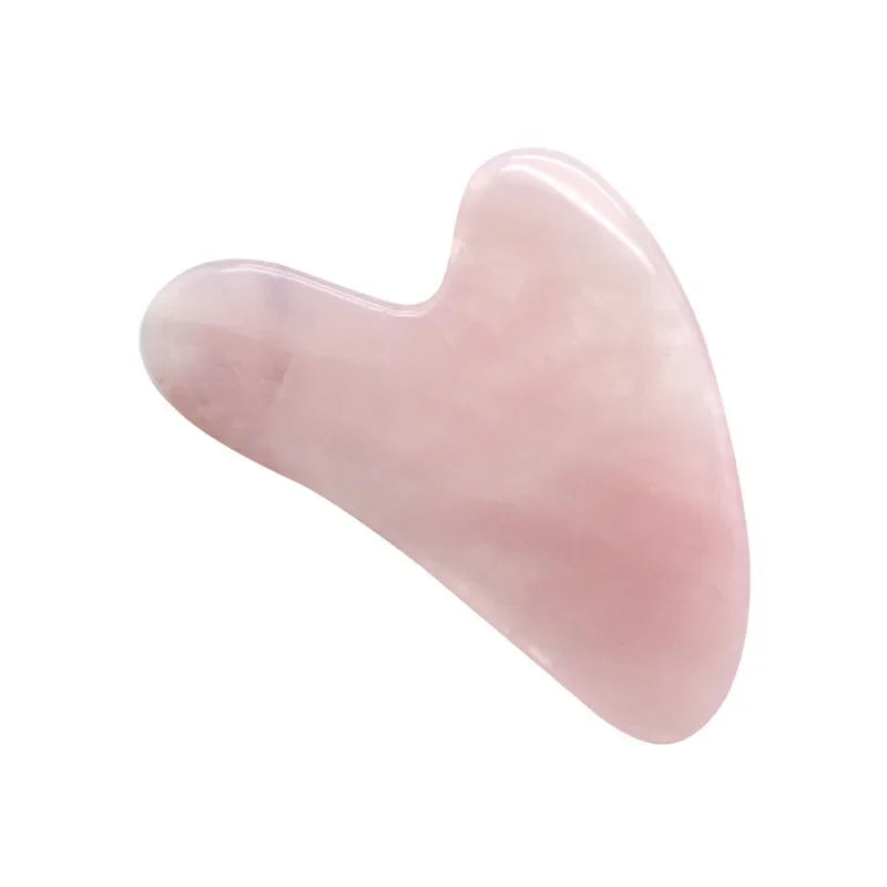 Rose quartz gua sha tool for facial and body massage therapy