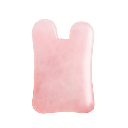 Rose quartz gua sha tool for facial and body massage therapy