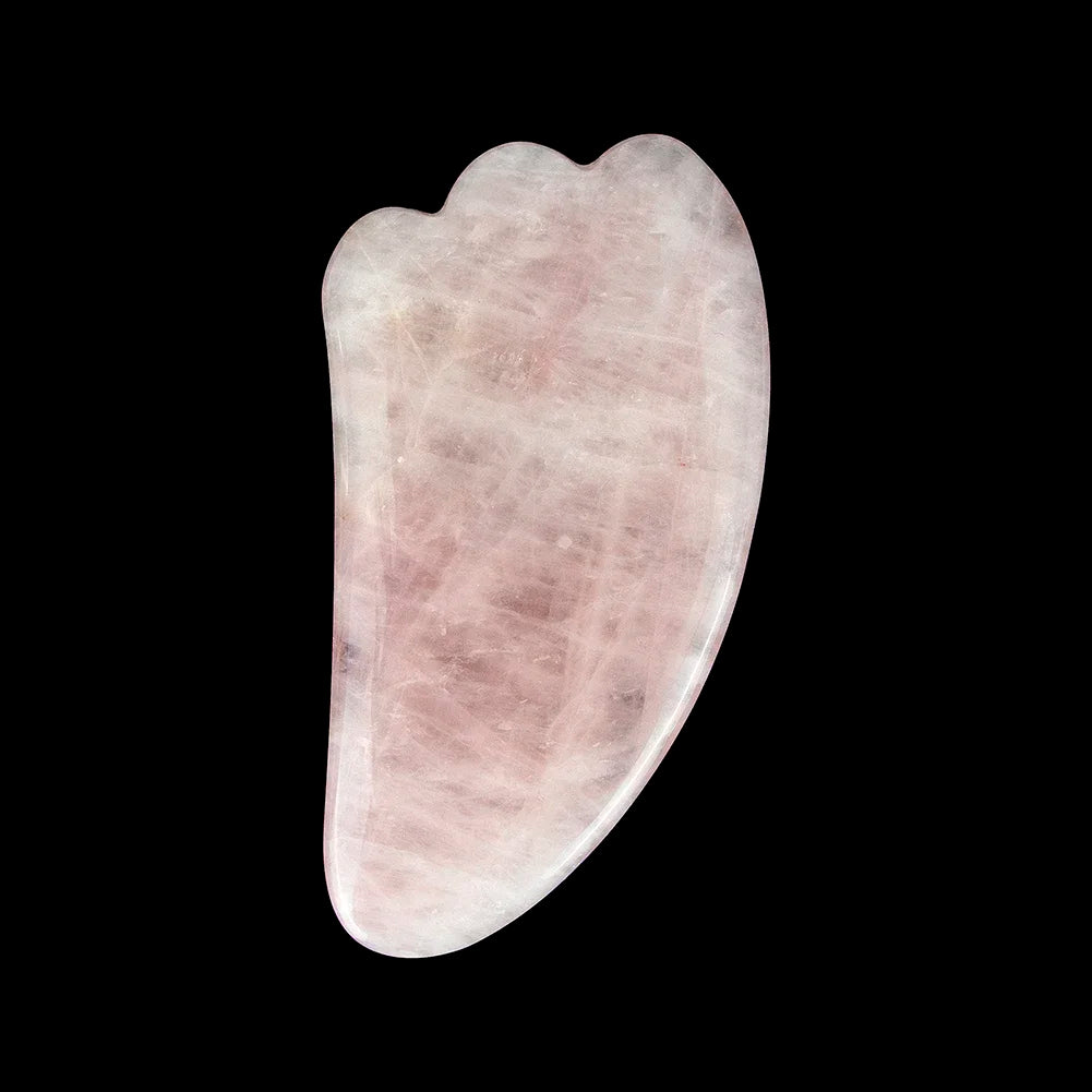 Rose quartz gua sha tool for facial and body massage therapy