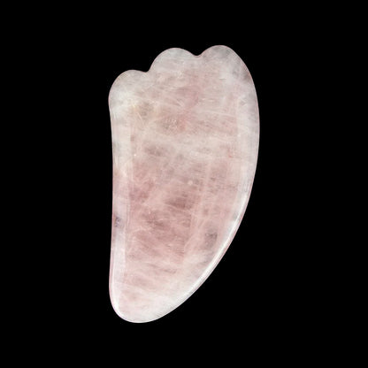 Rose quartz gua sha tool for facial and body massage therapy