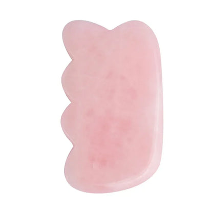 Rose quartz gua sha tool for facial and body massage therapy
