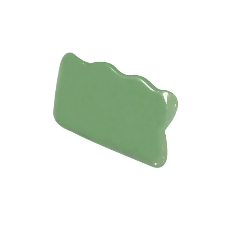 Rose quartz gua sha tool for facial and body massage therapy