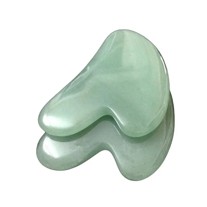 Rose quartz gua sha tool for facial and body massage therapy