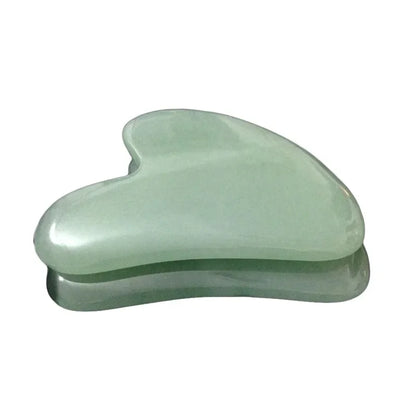 Rose quartz gua sha tool for facial and body massage therapy